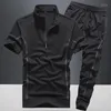 Suisses de survêtement masculines Costumes de sport de survêtement Suissins de sport lisses mâles T-shirt pas de logo pour hommes Pantalons de sports de sport de gym