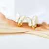 Schmetterlingsclip im Korea -Stil auf Ohrringen ohne piercing niedlich ohne Loch Goldfarbe Harz Schmuck Ohrmanschette Party Geschenk 240418