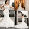 Bridal Mermaid Hochzeitskleid Kleider mit 3D Blumenapplikationen Langarmer hoher Nacken maßgeschneiderter Kristalle Perlen Sweep -Zug Plus Größe Strand Vestidos de Novia