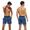 Herren -Shorts Datifer Sommer 2024 Herren Shorts Solid Color Gymnastik Mesh Liner mit Reißverschluss in Taschen Strand Schnell trockener Bermudas Maskulina Badeanzüge