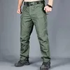 Calças masculinas Novas calças táticas de calças táticas elásticas de bolso de bolso Military Military Tactical Toushers Tactical Calça de carga à prova d'água 6xll2405