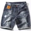Zomerheren denim shorts mode slanke fit elastische katoen blauw wassen gescheurde jeans mannelijk merk kleding 240422