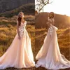Élégants robes de mariée à l'arrière ouvert 2024 Gapes à manches plafonnées Appliques de dentelle d'été Boho Tulle Bridal Robes avec train