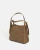Totes 2024 NICHE DESIGNER Luxury Retro Bucket Bag Exquisite and Versatile Handbag High-End Casual Simple Shoulder Phone