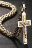 Collier pendant croix lourd