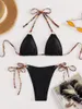 Swimwear pour femmes Bikini noir sexy 2024 Femme lien de bague en métal licolon