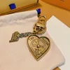 Amantes cardíaco de designer de coração de luxo de luxo caro de caça a chaves de ouro Chave de ouro Chain feminina Bolsa Charm Key Ring com caixa