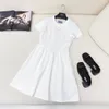 Designer Dress zomer nieuwe mode ronde nek korte mouw slanke heup wrap jurk Amerikaanse zwart witte dameskleding Amerikaans zwart witte dameskleding