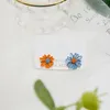 Boucles d'oreilles Stud Fashion Hollowing Daisy Baking Paint Alloy Gagnes Bijoux For Women Party Birthday Gift Accessoires