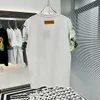 2024 Tees diseñadores para hombres T CAMISA HOMBRE MOMENTS CON LETRAS CAMISAS DE MANUES CORTAS CAMISAS DE SUMERA Men sueltos Tamaño asiático S-xxxl 420