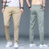 Herrenhosen Eis Seidenmänner dünne Stretchleichter sommerlicher Sommer Taille Baumwolle Klassische koreanische Hosen Männlich großer Jogging Sweatwear