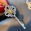 Luksusowy Tiifeniy Designer Naszyjniki Yadu Biżuteria 18K Złoty naszyjnik Naturalny żółty diament Swallowtail Key Sweat
