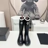 Canali sandali chan sandali marcati da donna rainboot lungo tubo medio 32 cm stivali da pioggia el 23ss di colore ad interblocco solido stivale di scarpe da donna alla moda