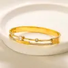 Einfache Mode Diamond Bangle Spring Neues Freizeitstil Geburtstagsgeschenk Schmuck 18K Gold plattiert Boutique Charm Bangle Edelstahlarmband Schwimm