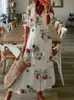 Elegant boho blommig tryck strand långa klänningar för kvinnor mode rufflesvneck kort ärm avslappnad söt lös maxi klänning 240418