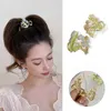 Autre Vanika New Sweet Metal Flower Hair Cl Femmes Summer Strave Coil Clip Clip Notain Pony Clip Clit Femme Femme Clip Clip Styling Ornement