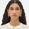 Bolzenohrringe Huanzhi Doppelwassertropfen für Frauen Mädchen vorne Asymmetrisches Design glattes Metall Mode Schmuckgeschenke 2024