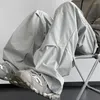 Męskie spodnie Wodoodporne spodnie Stylowy ładunek unisex z dekoracją nitu szeroką luźną konstrukcję do streetarii lub na zewnątrz