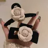 Annan höst ny flockande blommor hårnål mode och elegant hästsvansklipp kvinnor hår grepp trend hear prydnad accessori för tjej