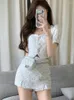 Frauen T -Shirts kleiner duftender Rockanzug Tweed Kurzmantel Puffärmel zweiteilige weibliche 2024 Sommermode für Frauen Korea
