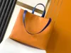 Designer bag original single quality soft cowhide medium size handbag shopping bag with top handle detachable shoulder strap zipper bag with double patch pockets