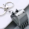 Tornari Creativi Creative Mini simulazione Bulldozer Torchia stereo Stereo Ecavatore Chiave Auto Tasto Metal Bulldozer Accessorio Modello Ornamento a pendente