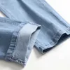 Jeans masculin jeans jeans trou de denim en ruine tendance élastique pantalon décontracté de haute qualité pantalon de grande taille J240507