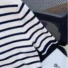 Camisetas femininas Termilhas de algodão listrado de troca de algodão listrado camisetas femininas femininas casuais com manga curta branca ladras pretas tops