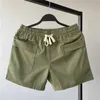 Short shorts verão running homens casuais academia preta fitness confortável cintura de cordão sólida bolsos múltiplos H240506