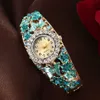 Heißer Verkaufs -INS -Stil Lady Gentleman Bracelet Watch College Style Full Diamond Cloisonne Uhr Luxus Uhr