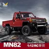 Elektrische/RC-auto NIEUW MN82 Mengniu Remote-gecontroleerde speelgoedauto 1 12 Model Auto RC Off-road voertuigsimulatie Off-road Pick-up Truck Children Toy Gift T240506