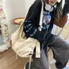 Bag Niche Design corean INS Messenger Canvas Femme chic grande capacité Étudiant Japonais Épaule diagonale Dumpling