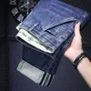 Span micro jeans maschile primavera e estate tasche inclinate semplici pantaloni lunghi ricamati a gamba ricamato ricamato