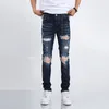 Jeans masculins Am Jeans Trendy Black Cow Shampooing Trou Faisant Old Patchwork Stretch Slim Jeans Men High Street Mens Jeans European Jean Hombre Letter Star Men