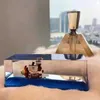 Action Toy Figures New One Piece 3D Ship Fluid Drift Bottle Thousand Sunny Ship Going Merry Boat Black Pearl Boat House Decoration Christmas Gifts T240506