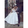 Korta remmar spaghetti chic klänning sexig 2018 backless älskling spets applikation eleganta brudklänningar billiga bröllopsklänningar