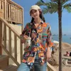 女性用ブラウスシャツレディースファッションカジュアルルーズレースショートシャツ新しい夏レトロ香港スタイルTシャツヒップホップベットプリントシャツハーフスリーブD240507