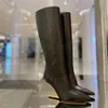 Invierno Nuevo Black Genuine Leather Toes Pointed Toes Boot Boots Boots de rodilla Gold Metal Tacón tallado Luxury para mujeres Botas de moda de la marca de diseñador de lujo Fábrica de fábrica