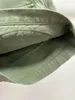 Jeans pour femmes de style américain marque militaire vert haute taille lâche accordéon de poche de travail de travail short denim pour le printemps 2024 de haute qualité