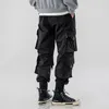 Pantalon masculin 2024 hommes Sautpuise noire jogging hip hop style militaire lâche American Street Wear Pockets Couleur continue