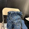 Sac à épaule mieux vendu Nouveau 90% d'usine Direct Salesxiaoxiang Danny Denim Garbage Diamond Grid Chaîne de grande capacité Sactume pour femmes