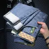 Blue Light Jeans Herren Frühling und Herbst High-End-Stickerei Leichter Luxus schlanker Fit kleiner Füße vielseitiger Harlan Hosen koreanischer Trend