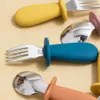 Tazas de platos Utensilios Nuevo diseño Alimento de alimentos para bebés Cuchara de comida sólida y horquilla sin bisfenol Un mango de silicona Cartoon Bear acero inoxidable Utensil para niños TA