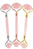 Natürliches gestürztes Chakra Rose Quarz geschnitzt Reiki Kristallheilung Gua Sha Schönheit Roller Gesichtsmassor Stick mit Legierung Goldplated3833581