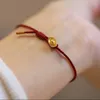 Bracelet ethnique de couleur or yuanbao rouge bracelet richesse des cadeaux de bijoux de l'année primordiale masculine et féminine