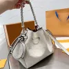 LVITY LVSE High Out Calfskin Leather Quality Woman Designer Hollow Mini Drawstring Bucket Bag med rund myntplånbok Stickband Lady Shoulder Handbag Luxury Pur