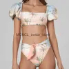 Женские купальники Puff Slves Split-Joint Bikini Bikini Двух частей сексуальная печать с высокой талией для праздничной юбки Женщины купание пляжная одежда H240507
