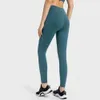 Leggings yoga per donne con tasche ad alto controllo della pancia ad alto controllo femminile.