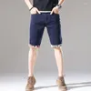 Short masculin Le hipster d'été vintage déchirant denim hommes mince pantalon coréen de cinq quarts