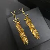 Earrings Luxury 18k Gold-Plated Earrings Brand Designer New Feather Shaped Pendant Earrings High-Quality Luxurious Charming Womens Earrings Birthday Party